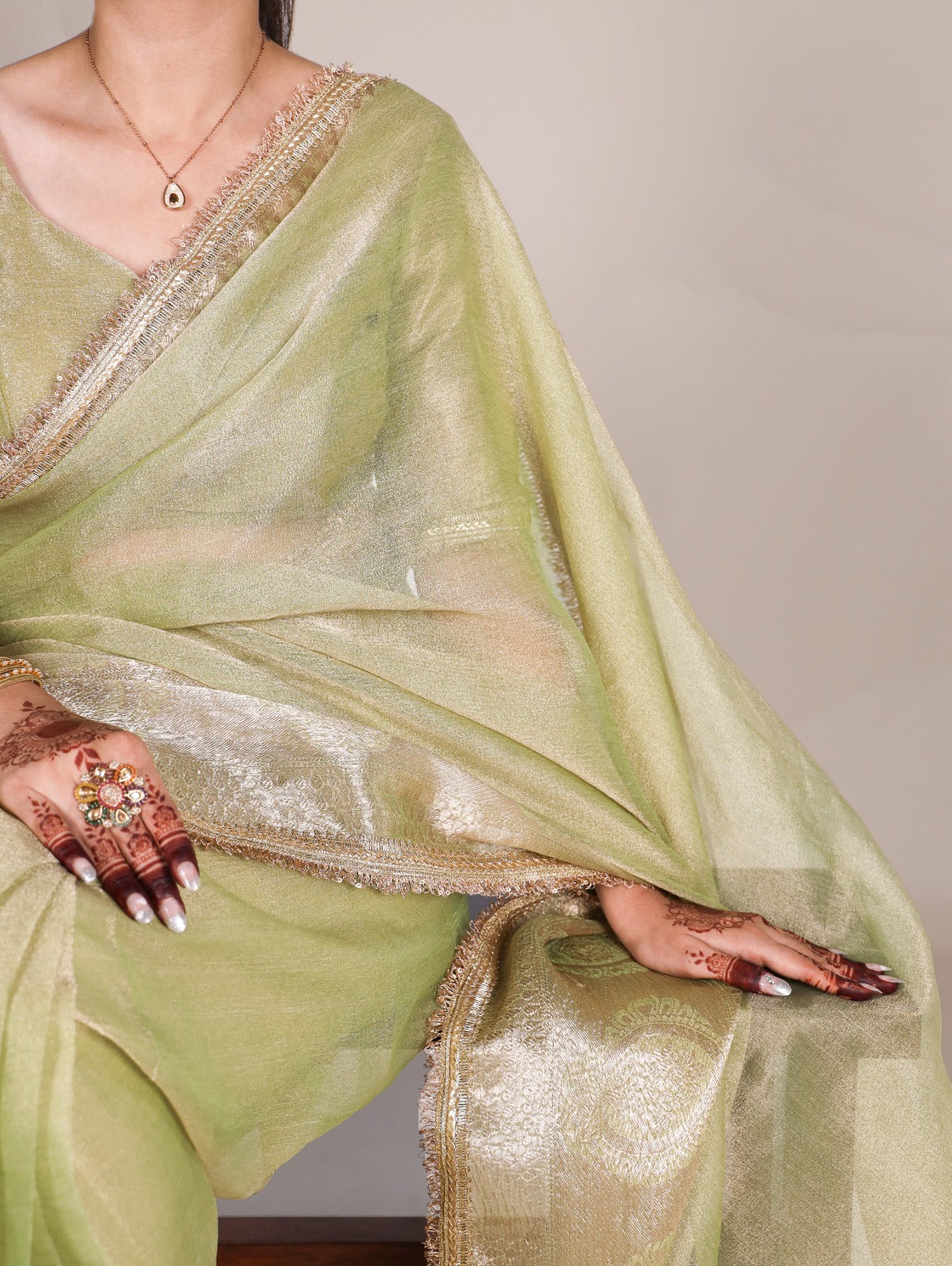 Pista Tissue Shimmer Zari With Sequins Lace Border Saree