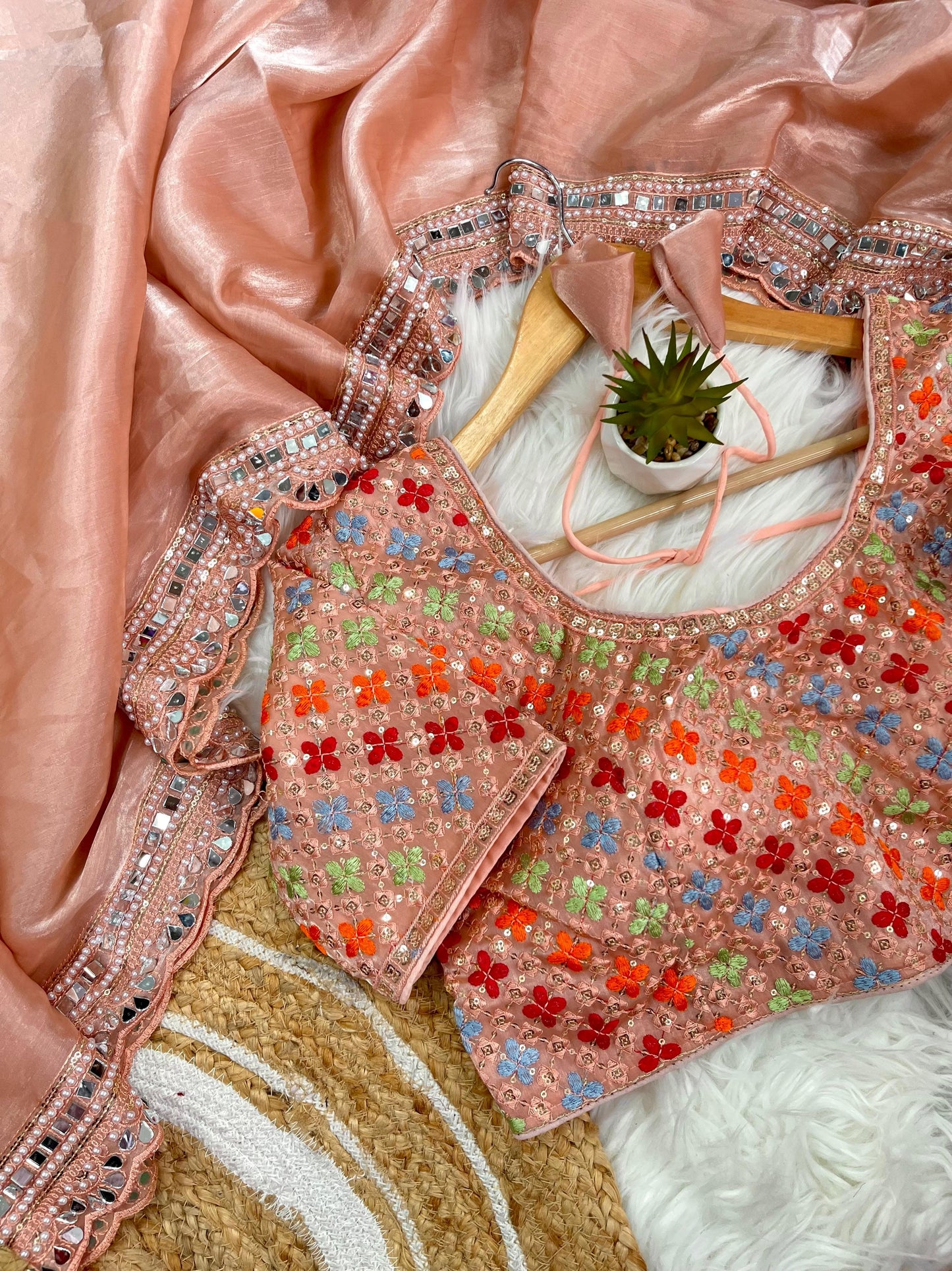 Peach Zimmy Choo silk With Heavy Border Saree