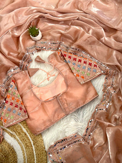 Peach Zimmy Choo silk With Heavy Border Saree