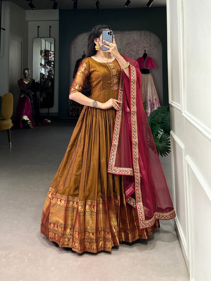 Mustard Zari Weaving Work Gown With Net Dupatta